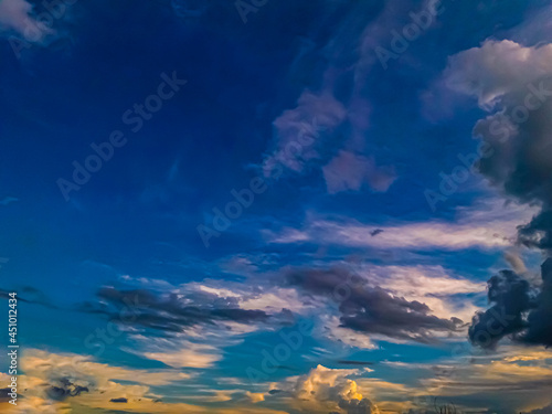 Sunset with clouds in the blue sky