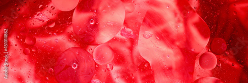 macro photo of water droplets in oil with a colorful abstract background