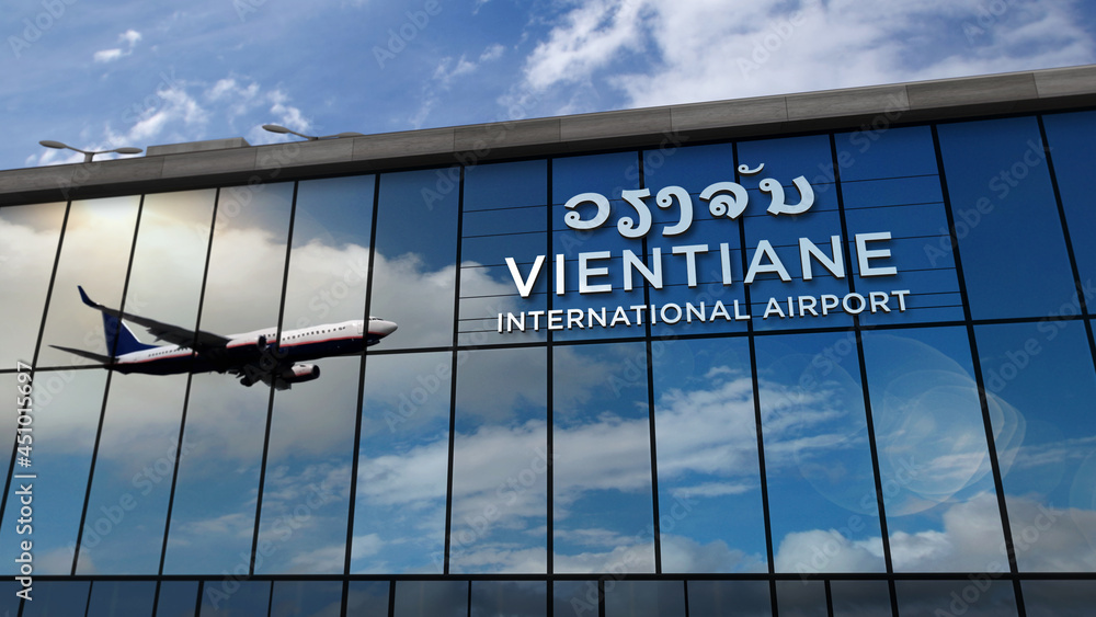 Obraz premium Airplane landing at Vientiane Laos airport mirrored in terminal