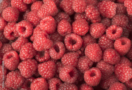 Background with ripe raspberry berries