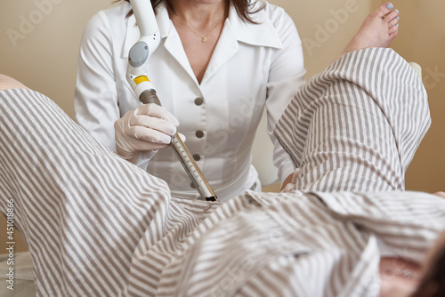 Vaginal laser procedure for womens health rejuvenatiom system which can transform vaginal health conditions. Laser to apply gentle energy pulses to the inner walls of the vagina. photo