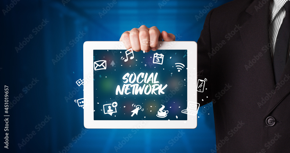 Person holding tablet, social network concept Person holding tablet, social network concept