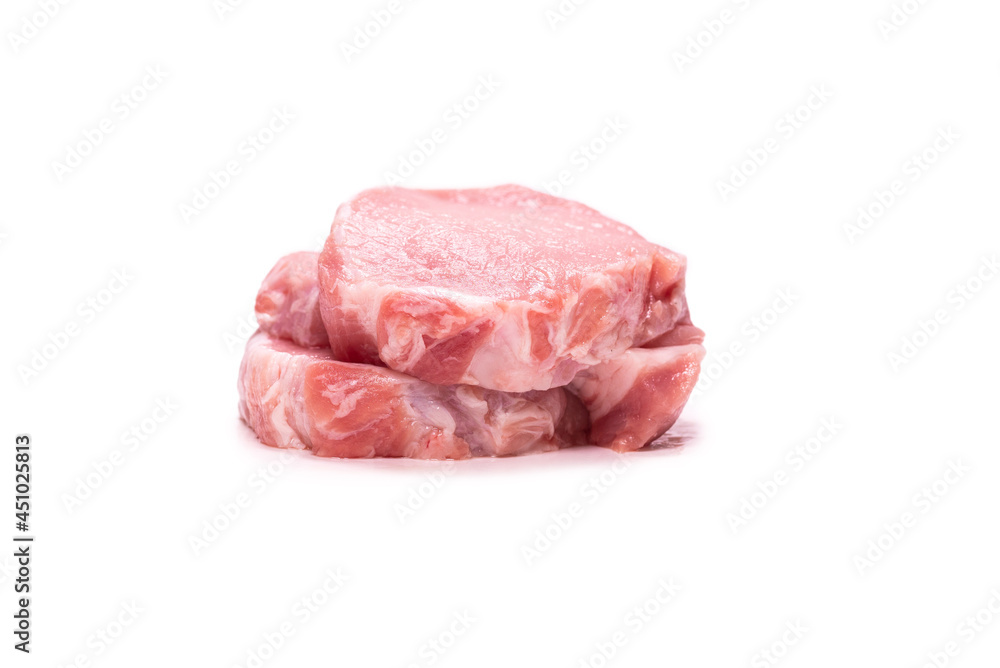 Raw pork pieces isolated on a white background. Raw pork pieces isolated on a white background.