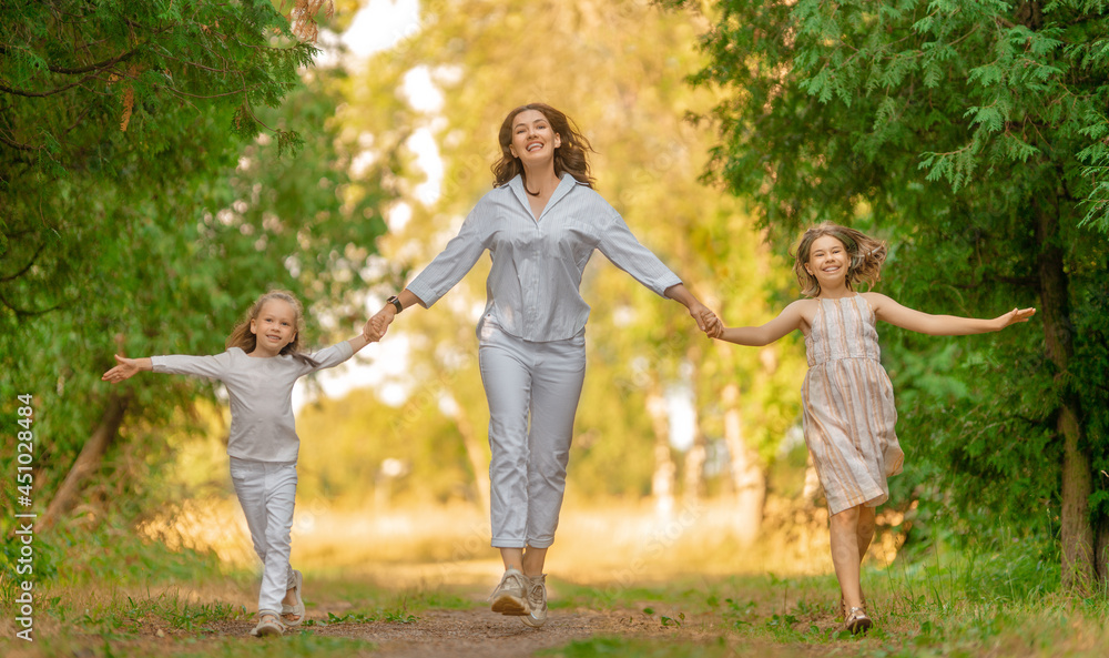 Fototapeta premium Happy family at sunset