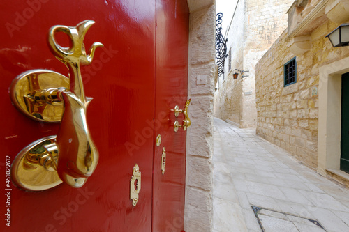 A nicely restored old wooden door in Imdina, Malta. photo