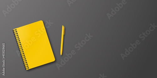Closed yellow notebook and yellow ball-point pen black background with copy space for your image or text. Minimalist vector illustration as back to school background. Top view, flat lay.