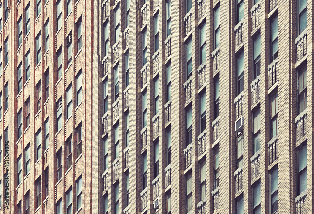 Close up picture of New York City old brick building, color toned urban background, USA. Close up picture of New York City old brick building, color toned urban background, USA.