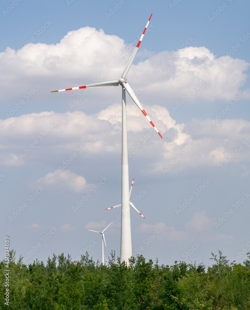 Wind turbines or windmills generating electricity. Renewable electric energy production. Vienna. Austria.