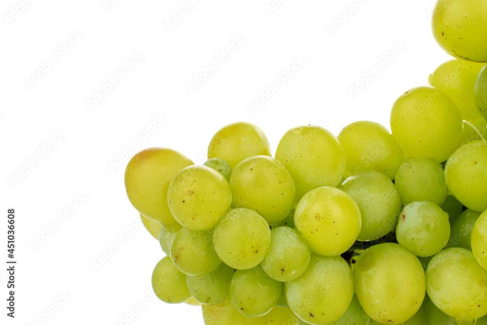 One ripe bunch of seedless grapes, close-up, isolated on white.