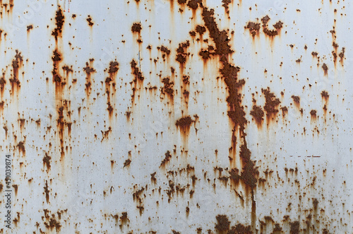 Old peeling paint. Rusty metal. Rust texture. Painted iron.