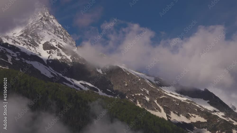 Slopes of Mountain Ridge under Snow. Close Up View Slopes of Mountain Ridge under Snow. Close Up View