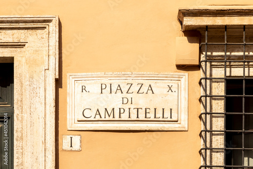 Street name piazza campitelli - engl. CAMPITELLI SQUARE -  painted at the wall in Rome photo