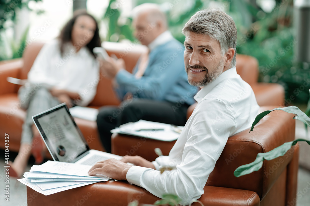 business man works with documents in the office . business man works with documents in the office .