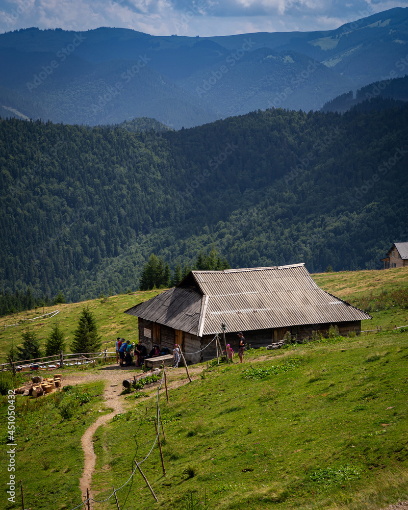 Alpine house in the mountains with a beautiful view of the Carpathians. Alpine house in the mountains with a beautiful view of the Carpathians.