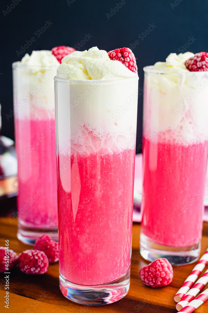 Raspberry Italian Cream Sodas Made Topped with Whipped Cream and Frozen