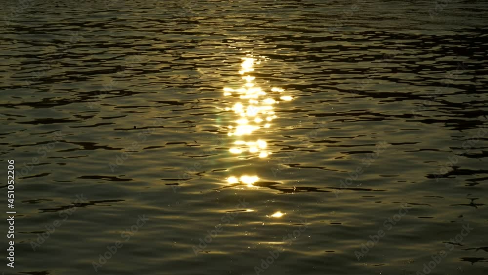 Reflection of rays of the sun on the water Reflection of rays of the sun on the water