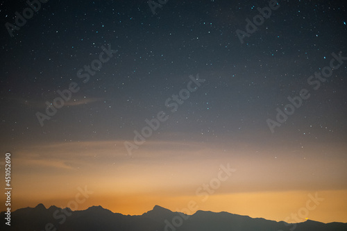 Orange sunset with starry sky