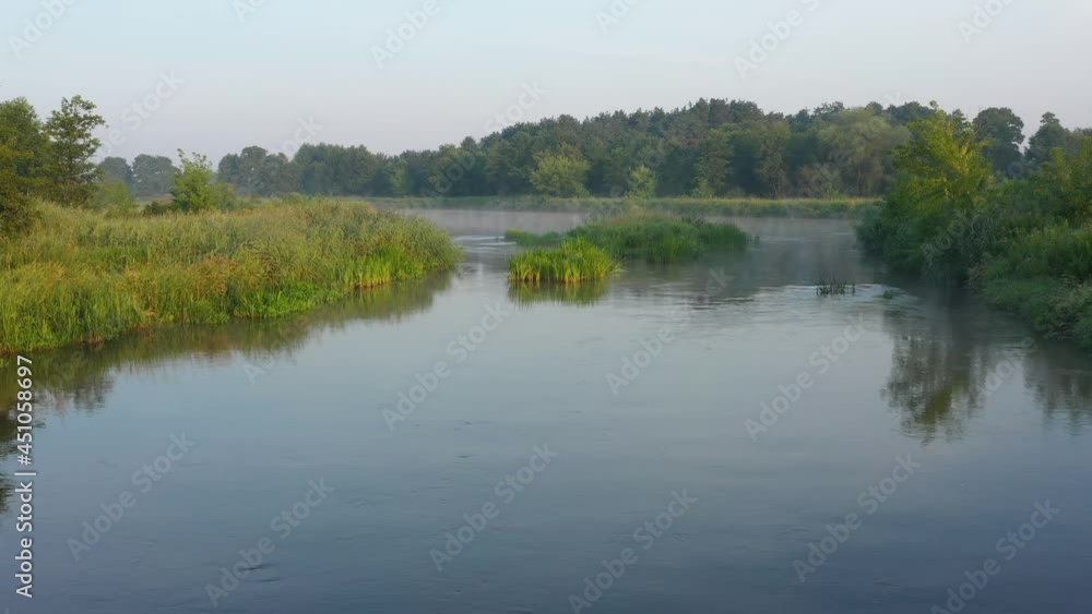 Aerial drone view of river covered with morning fog Aerial drone view of river covered with morning fog