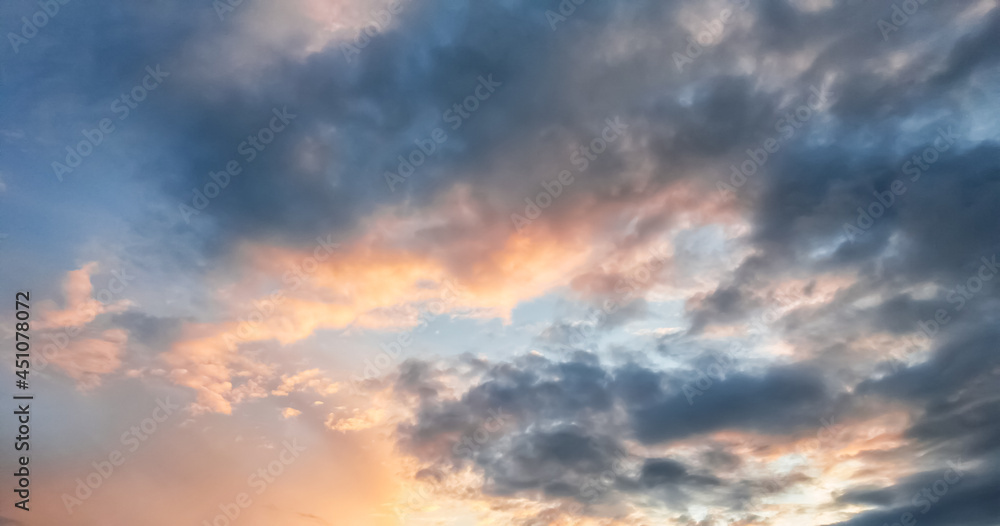 Sunset or sunrise, sky nature background with multicolored clouds