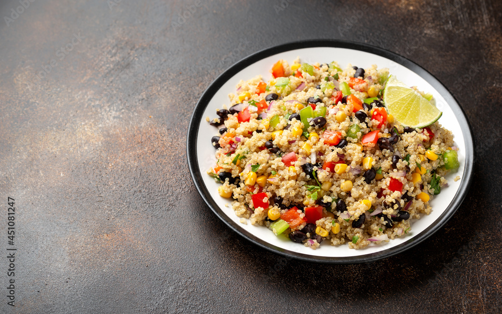 Quinoa black bean salad with corn, red green pepper, onion. Healthy food. Quinoa black bean salad with corn, red green pepper, onion. Healthy food.