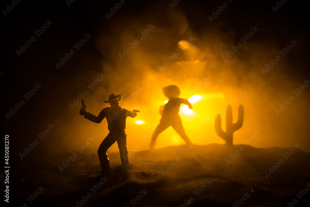 Fototapeta premium Western cowboy silhouette with texture at sunset and slivers of light