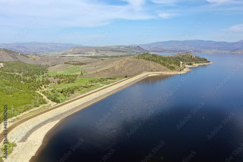 Aerial view of Lake Granby, Colorado and surrounding mountains and forests on calm sunny summer morning. Aerial view of Lake Granby, Colorado and surrounding mountains and forests on calm sunny summer morning.