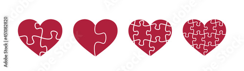 Puzzle heart shapes. Puzzle pieces. Valentine day symbol.