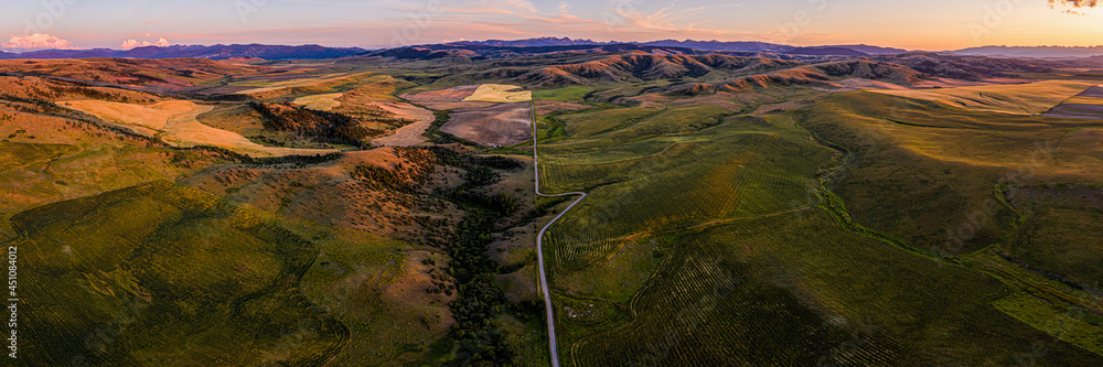 Southwest Montana foothills farmland fields patchwork panorama at sunset - Gallatin Valley - Spanish Peaks - Rocky Mountains