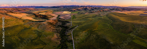 Southwest Montana foothills farmland fields patchwork panorama at sunset - Gallatin Valley - Spanish Peaks - Rocky Mountains photo