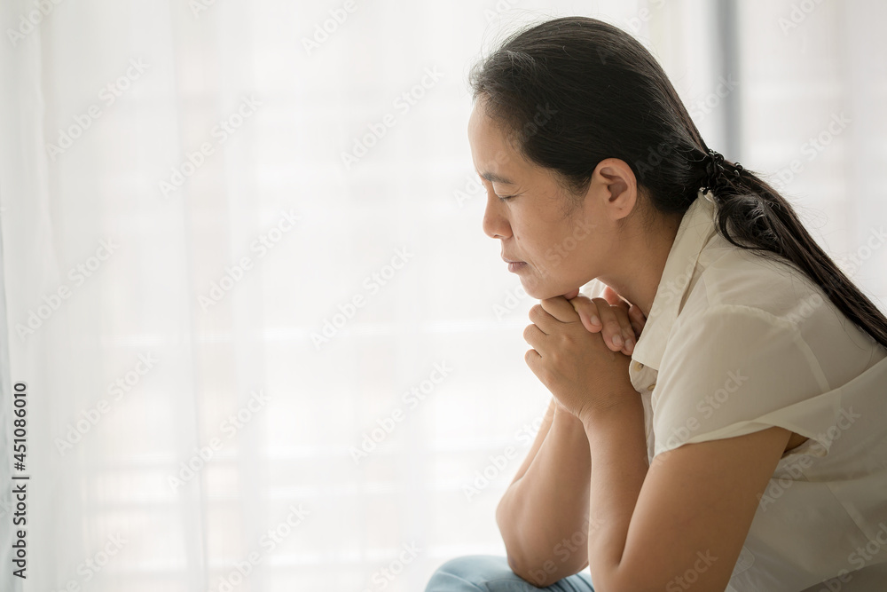 Woman Pray for god blessing to wishing have a better life. Woman Pray for god blessing to wishing have a better life.