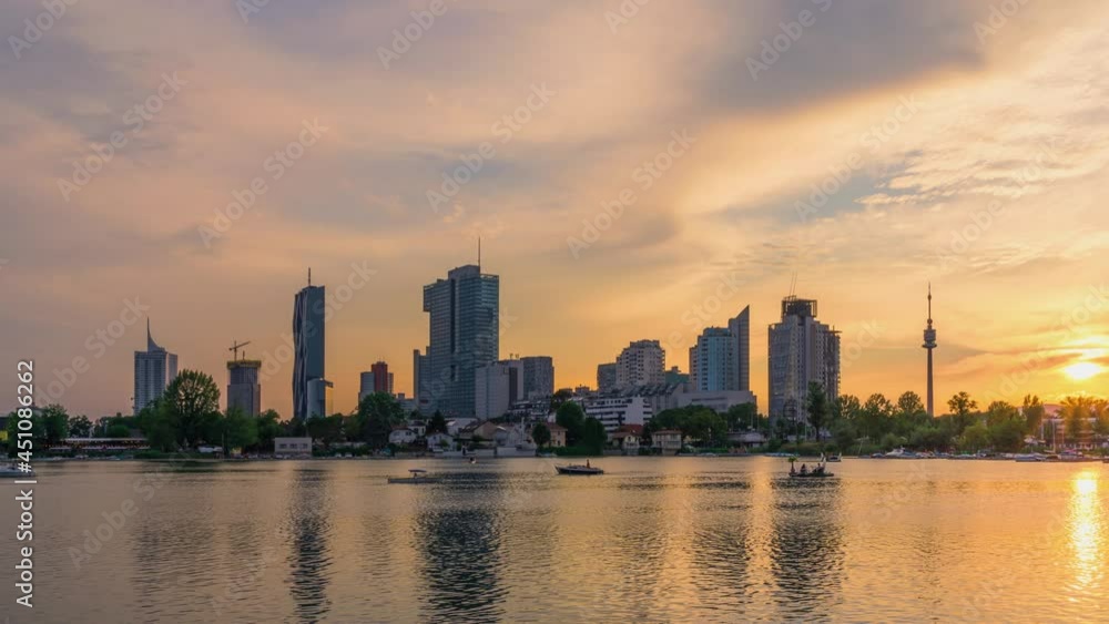 Vienna Skyline Downtown - international center skyscrapers with Kaiserwasser lake - Austria day to night Timelapse with Clouds Vienna Skyline Downtown - international center skyscrapers with Kaiserwasser lake - Austria day to night Timelapse with Clouds