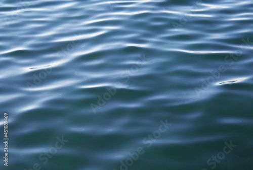 Blue smooth surface of the sea, blue water, nature.