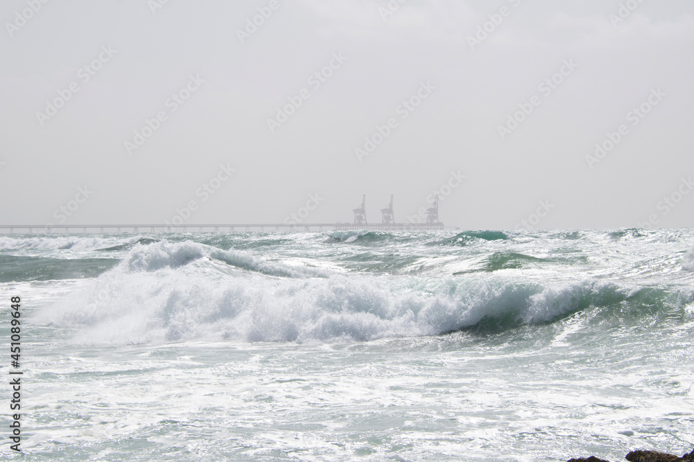 waves crashing on the beach