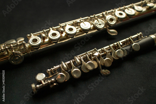 Musical wind instrument piccolo flute and brass flute. High quality photo photo