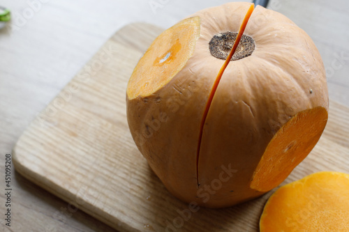 cut pumpkin many grains knife photo