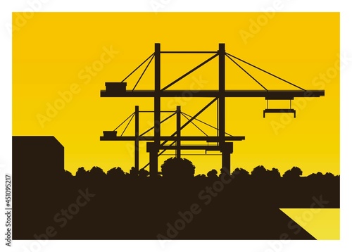 Silhouette of container crane in a harbor at the afternoon, 