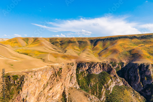 The spectacular geological landscape of the Kuokesu Grand Canyon,Xinjiang,China.Aerial view. photo