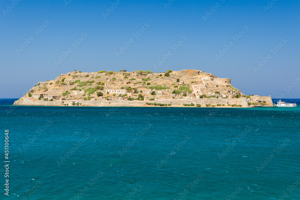 Panoramic view of the ancient Venetian fortress and former leper colony of Spinalonga island, Crete, Greece