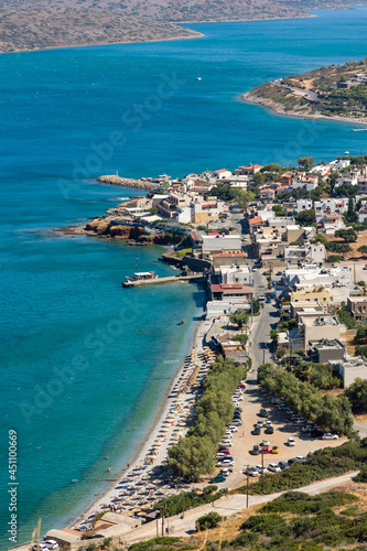 Small Greek coastal village with beach and clear blue sea (Plaka, Elounda, Crete) © whitcomberd