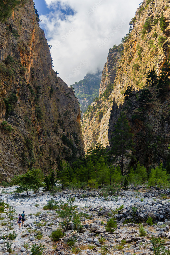 Beautiful mountain scenery of a gorge surrounded by tall cliffs and ...
