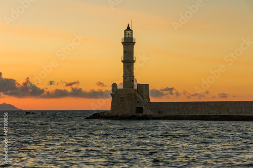 Ancient venetian lighthouse in the Cretan city of Chania at dusk © whitcomberd