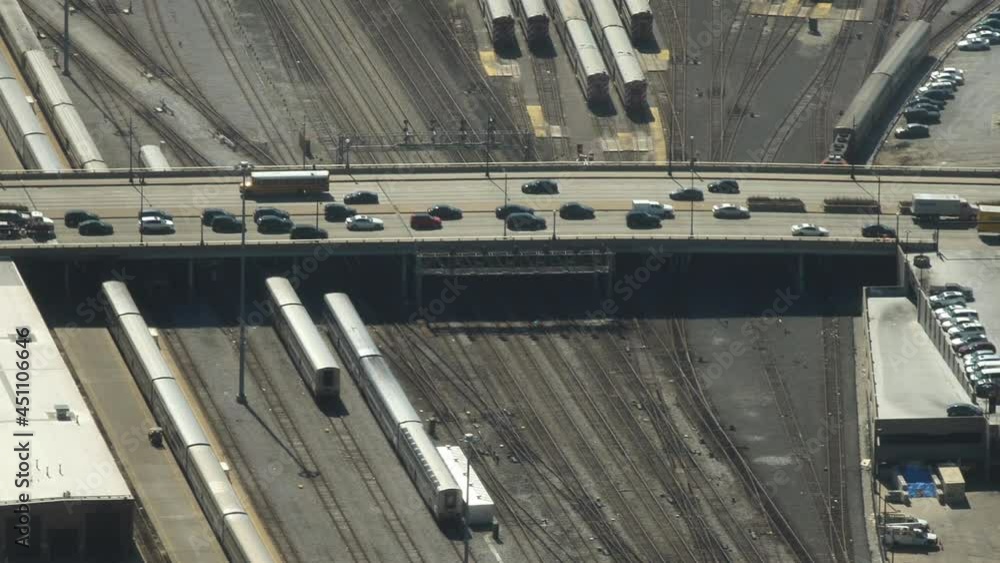 Busty Daily Traffic in Chicago, Illinois USA. Rush Hour on Bridge Overpass Train Station and Railway on Very Hot Sunny Day, Slow Motion Busty Daily Traffic in Chicago, Illinois USA. Rush Hour on Bridge Overpass Train Station and Railway on Very Hot Sunny Day, Slow Motion