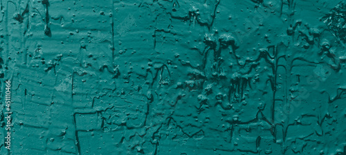 Pine green paint brush textured wall background