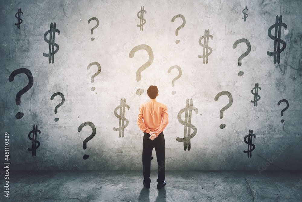 Businessman look at question mark and dollar symbol Businessman look at question mark and dollar symbol