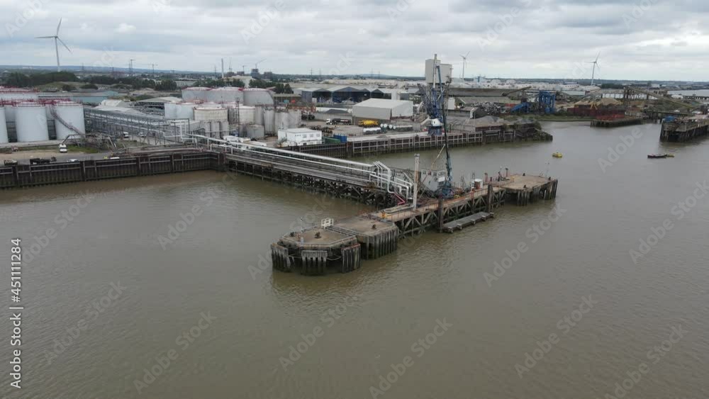 Jetty dock ,Cemex storage Plant Essex on river Thames Aerial footage Jetty dock ,Cemex storage Plant Essex on river Thames Aerial footage