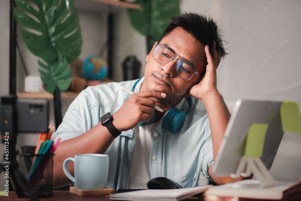work from home concept Businessmen use smartphones and laptops as devices. Record and broadcast live on internet social media.
work from home concept Businessmen use smartphones and laptops as devices. Record and broadcast live on internet social media.
