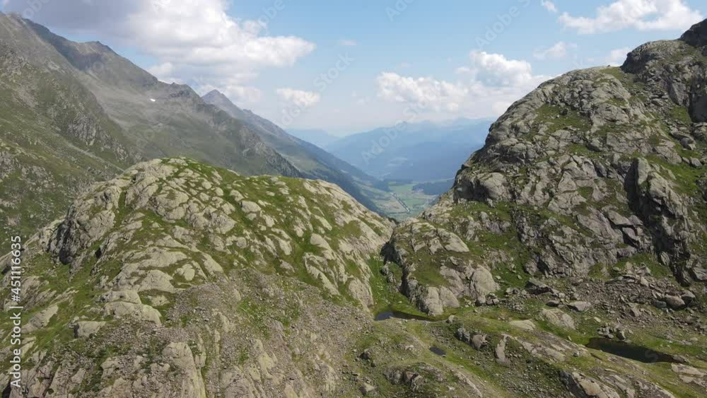wide angle drone video of the beautiful mountains in northern Italy with the view over mountains and valleys. near the dolomites in South Tyrol. wide angle drone video of the beautiful mountains in northern Italy with the view over mountains and valleys. near the dolomites in South Tyrol.