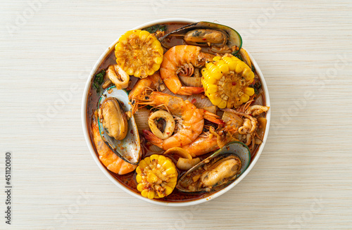 spicy barbecue seafood - shrimps, sqiud, mussel photo