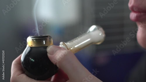 Wallpaper Mural Close Up Of Smoking Pipe With Medical Marijuana Held By Female Hand. Torontodigital.ca