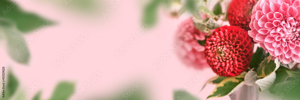 Banner with Autumn bouquet of beautiful flowers. Autumn festive decoration in pink colors, selective focus Banner with Autumn bouquet of beautiful flowers. Autumn festive decoration in pink colors, selective focus